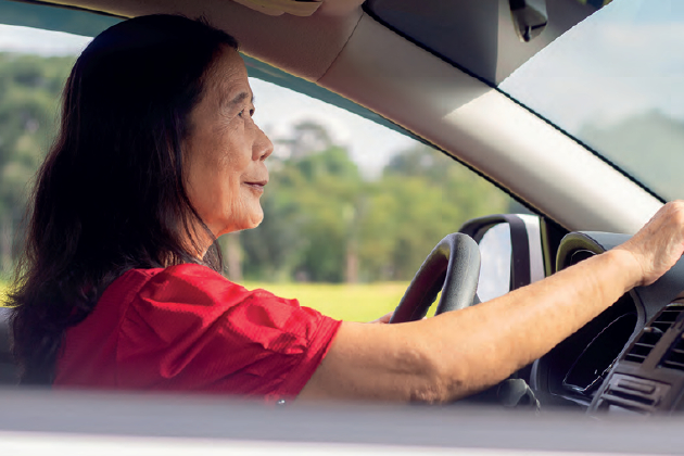 Eyes right older people driving Older lady in a car driving