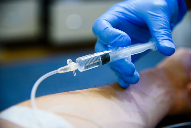 A patient receiving an injection